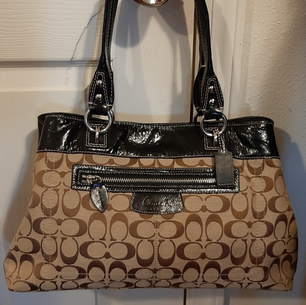 Great condition, Signature brown and tan with leather black trim